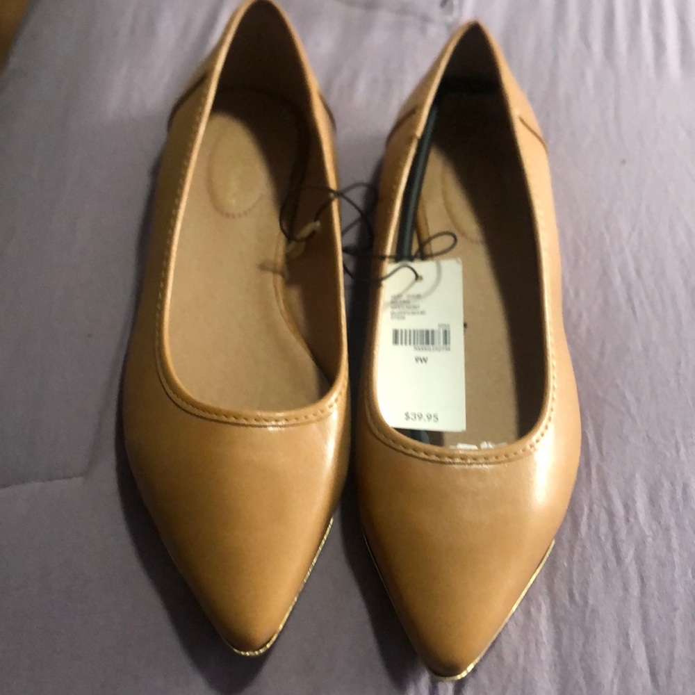Tan flat shoes
